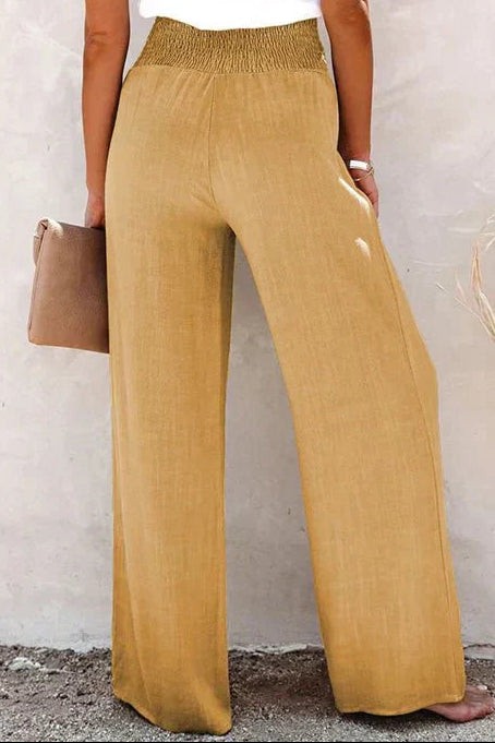 Woman wearing gray wide leg pants