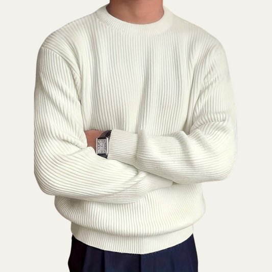 Man wearing a crew neck knit sweater