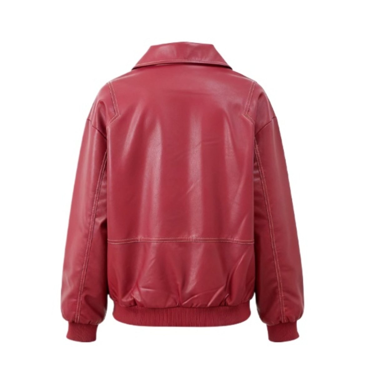 Woman wearing an oversized red faux leather bomber jacket with white contrast stitching