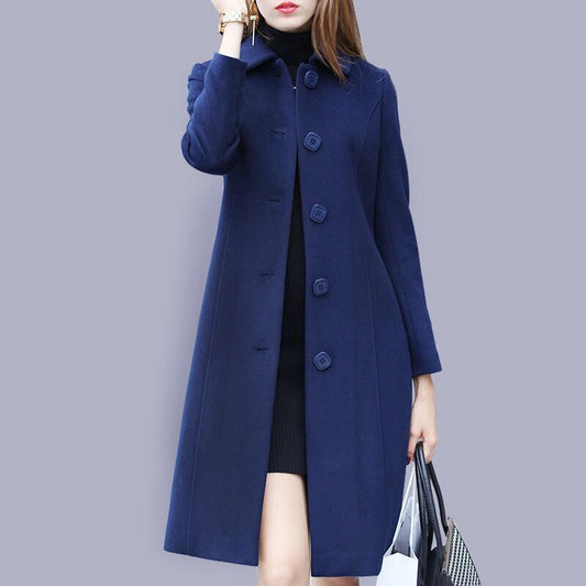 Navy fit and flare trench coat for women.