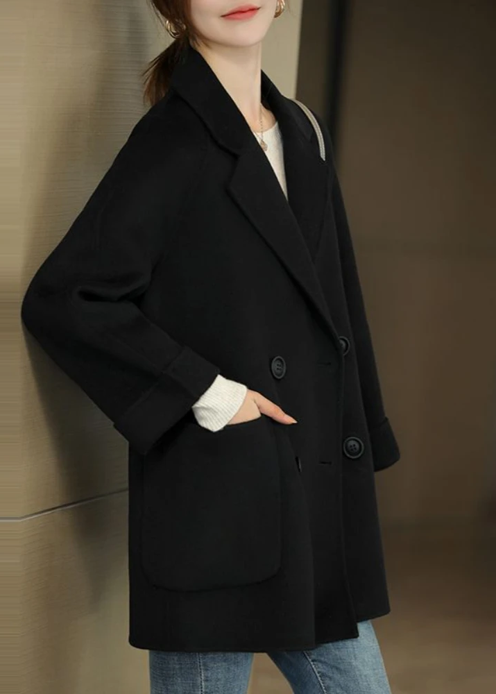 Black oversized trench coat for women.