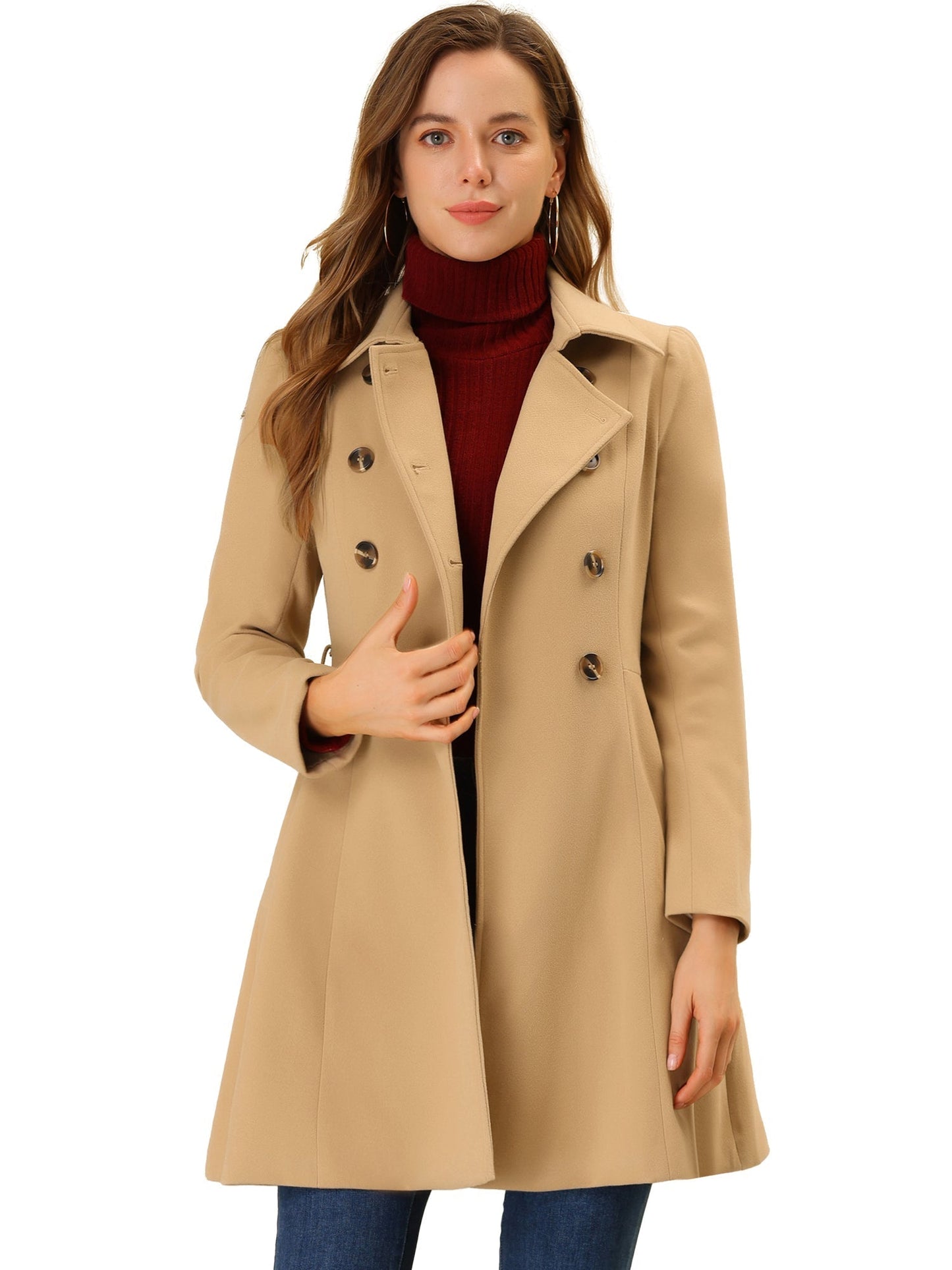 Woman wearing a double-breasted flared mid-length trench coat with notched collar
