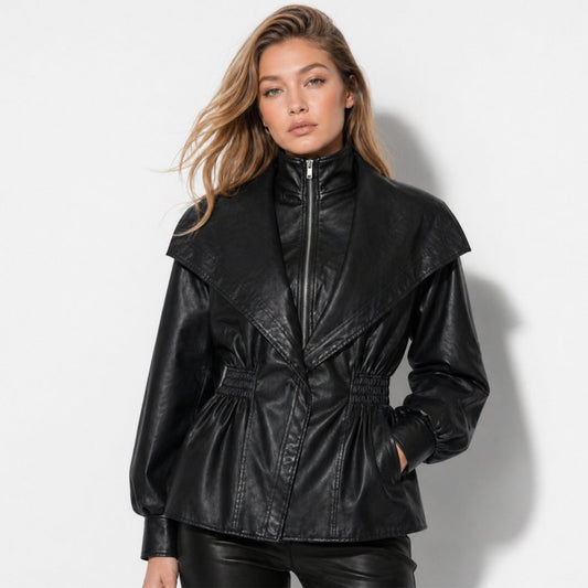 Woman wearing a cinched waist faux leather funnel neck jacket