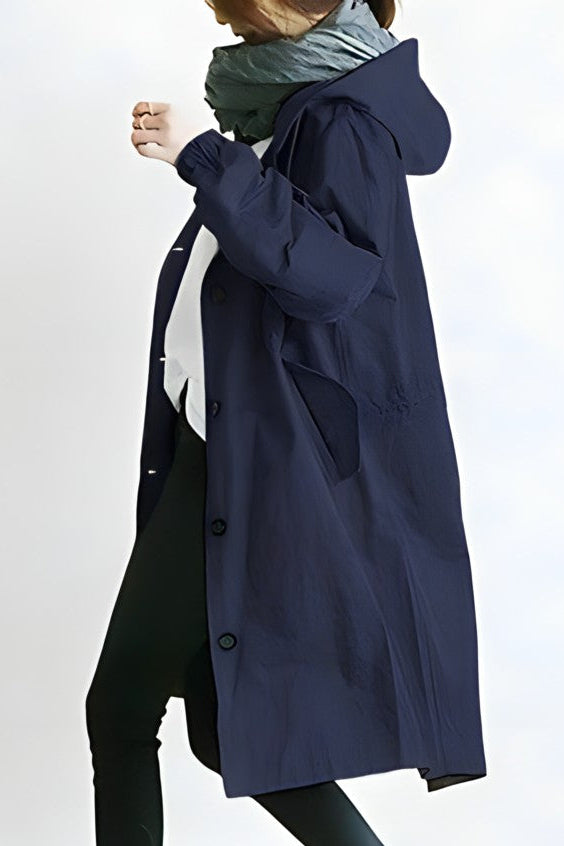Woman wearing a belted trench coat
