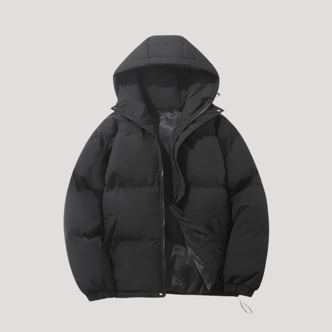 Woman wearing an insulated hooded quilted puffer coat