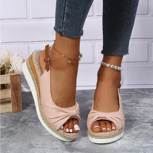 Women's peep-toe wedge slides