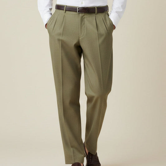 Man wearing formal pleated suit pants