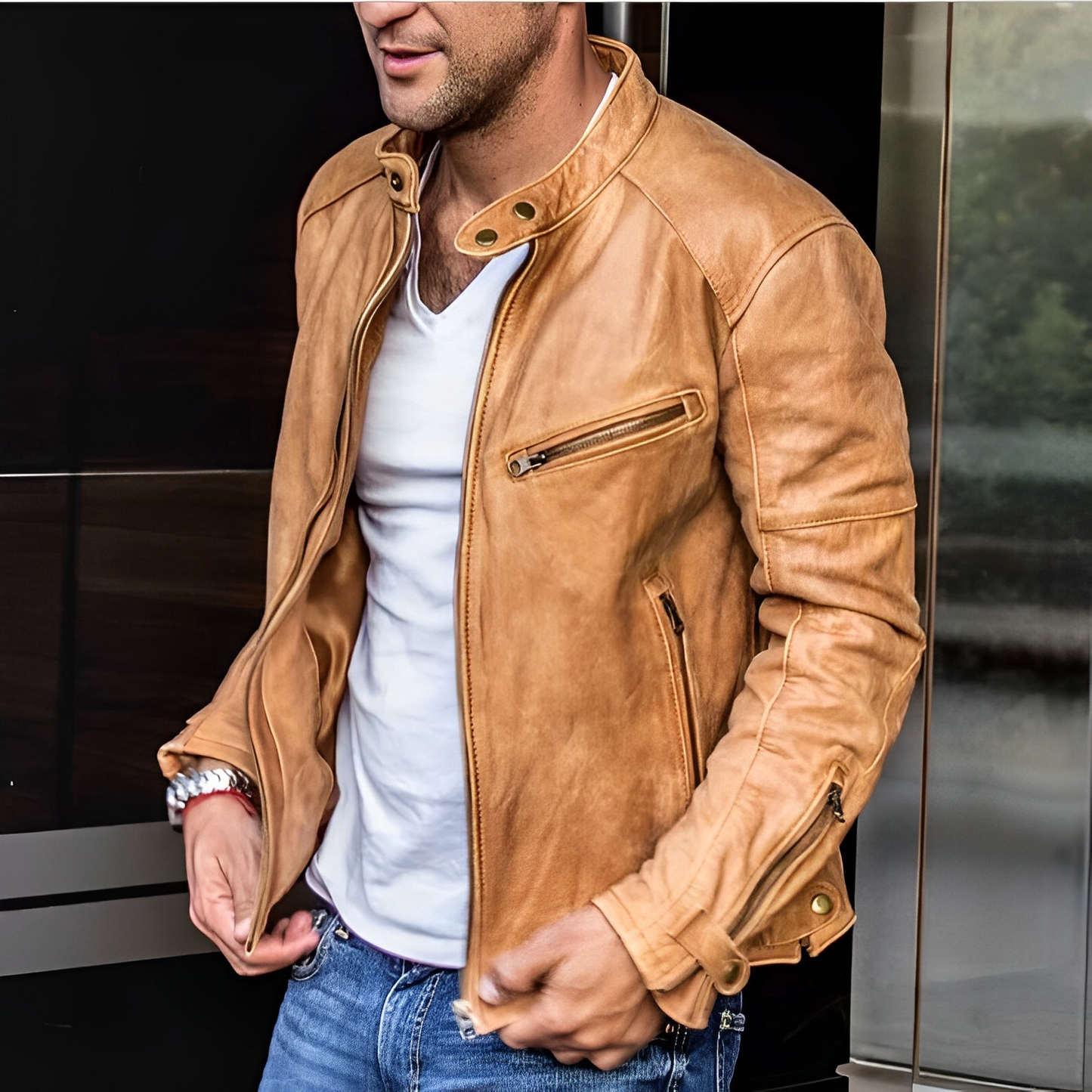 Man wearing a brown faux leather jacket