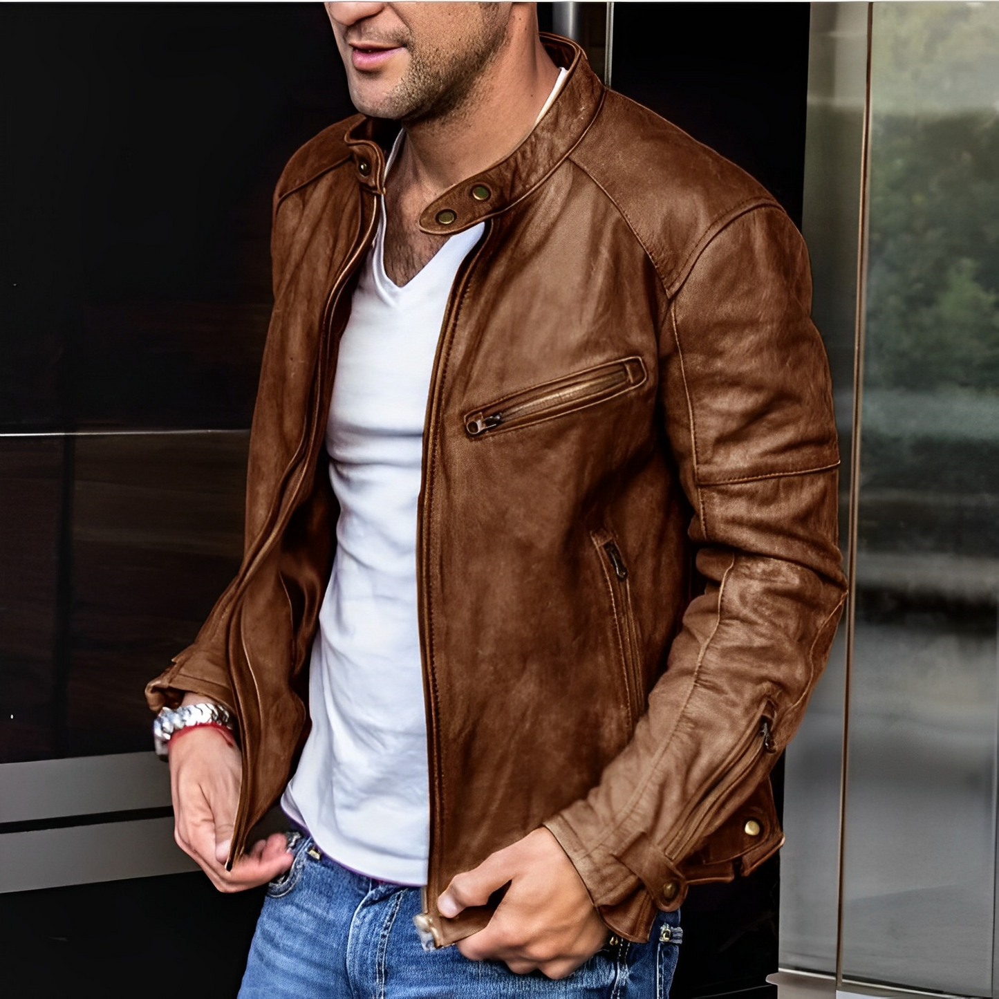 Man wearing a brown faux leather jacket
