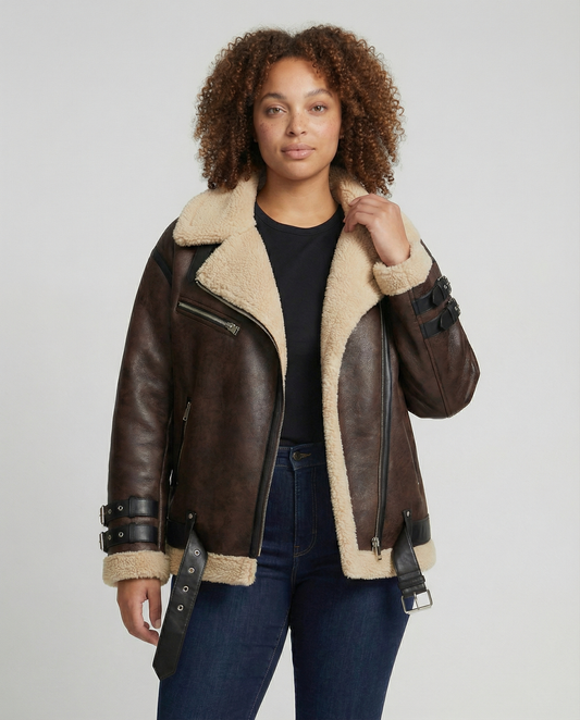 Woman wearing a brown faux leather moto jacket