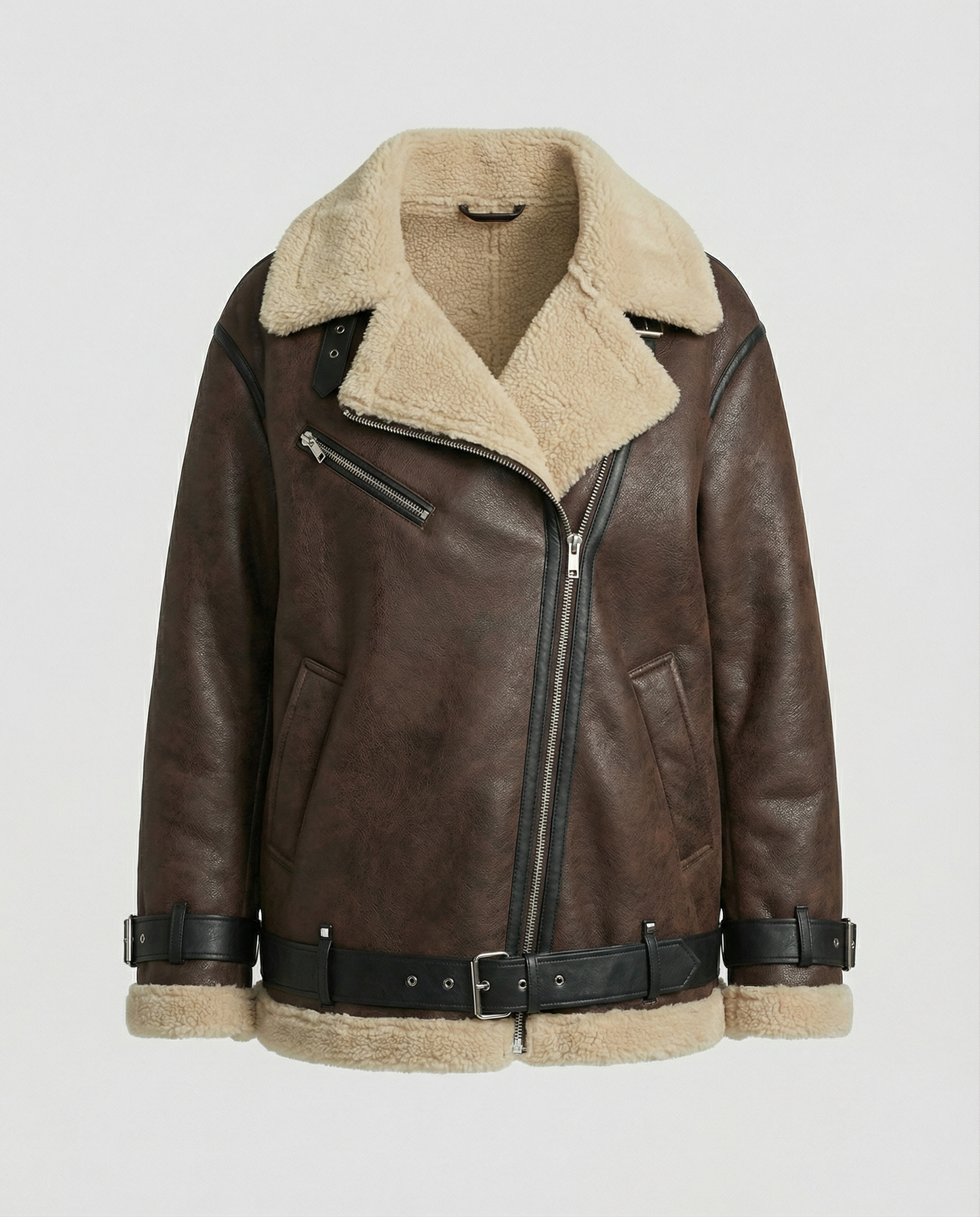 Woman wearing a brown faux leather moto jacket