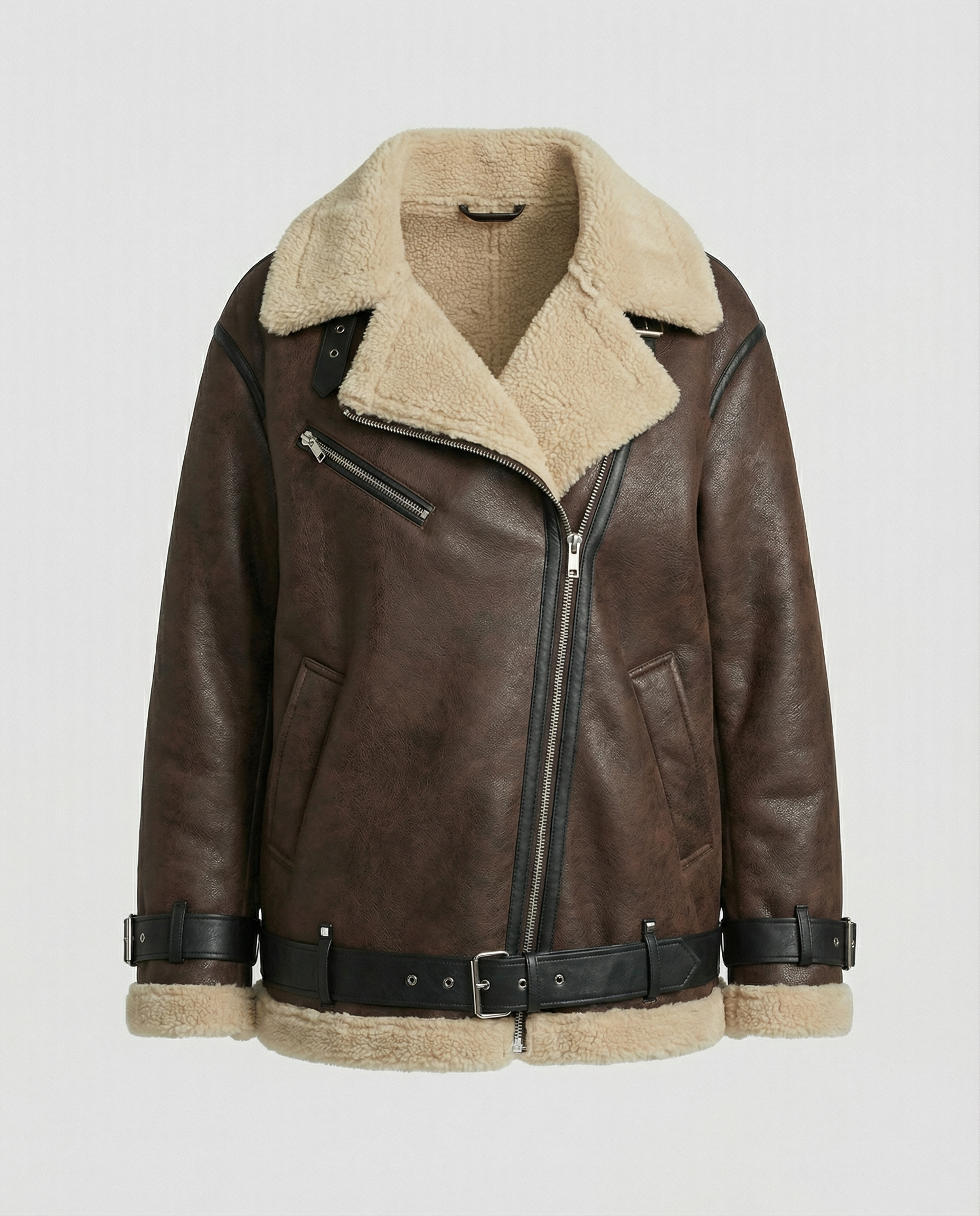 Woman wearing a brown faux leather moto jacket