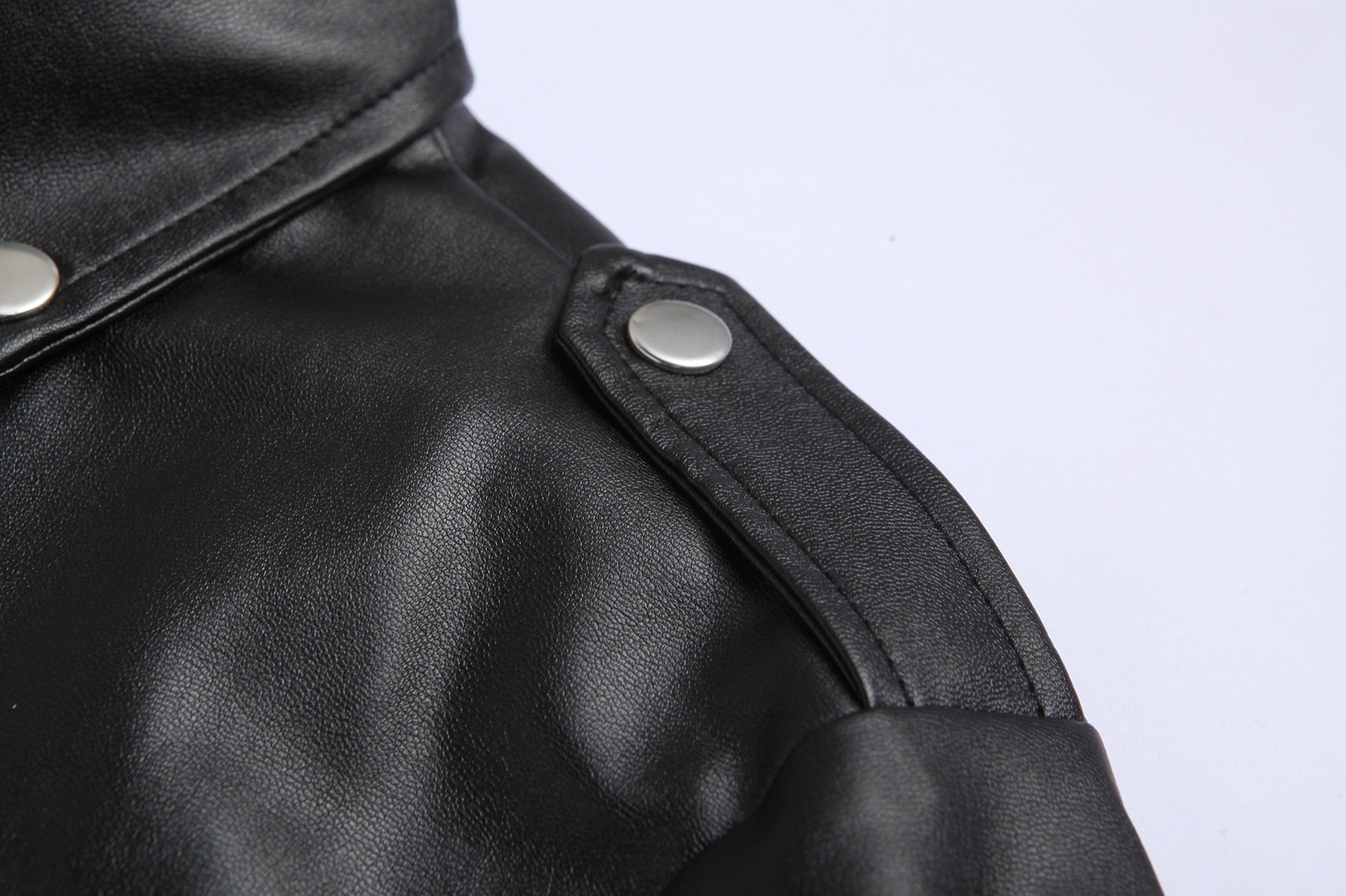 Man wearing a black slim fit moto jacket