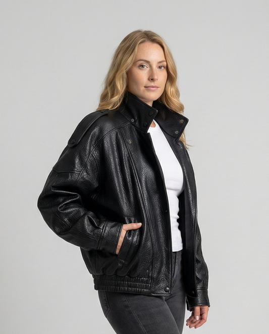 Woman wearing an asymmetric faux leather biker jacket