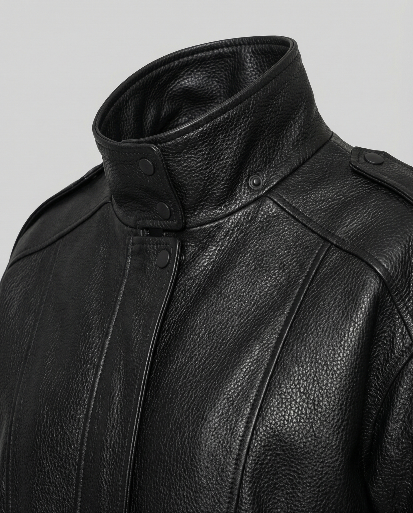 Woman wearing an asymmetric faux leather biker jacket