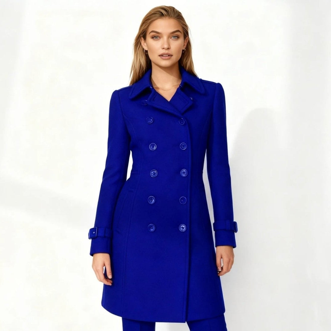 Woman wearing a tailored double-breasted wool coat with notched lapel