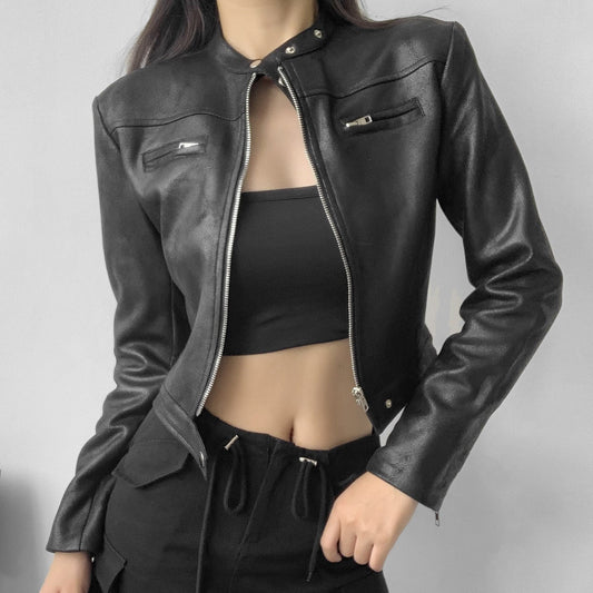 Woman wearing a cropped faux leather jacket