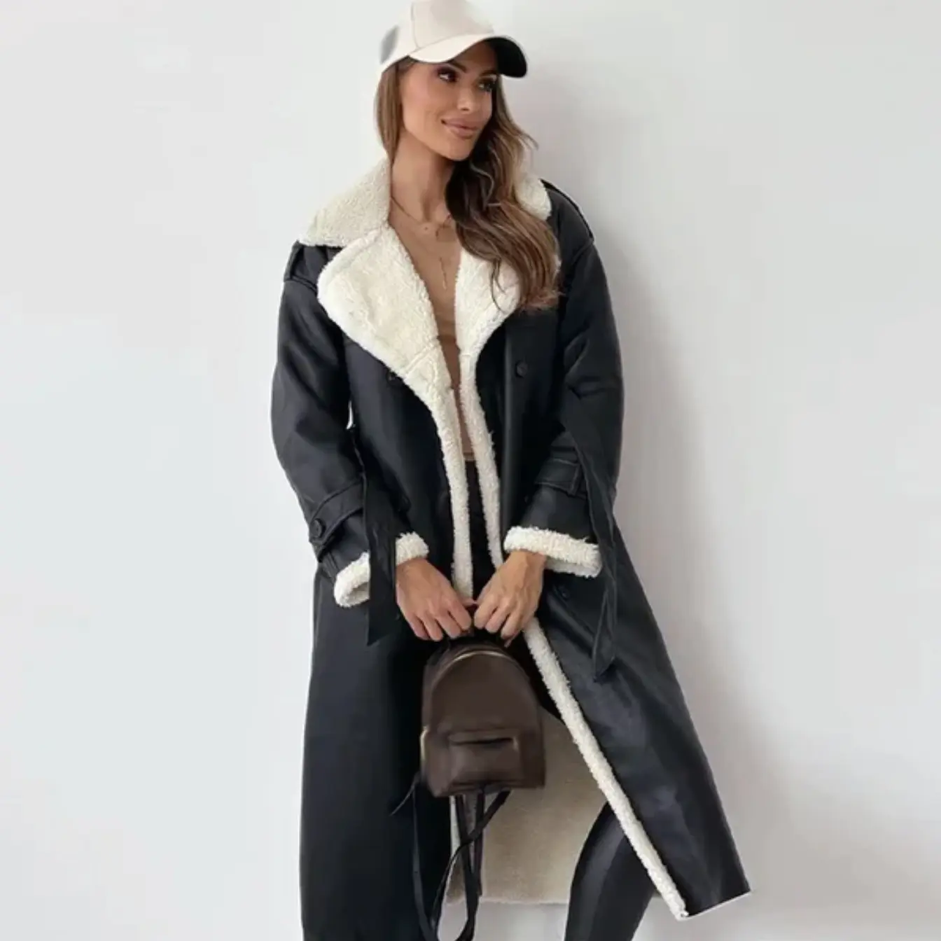 Black shearling lined trench coat for women.