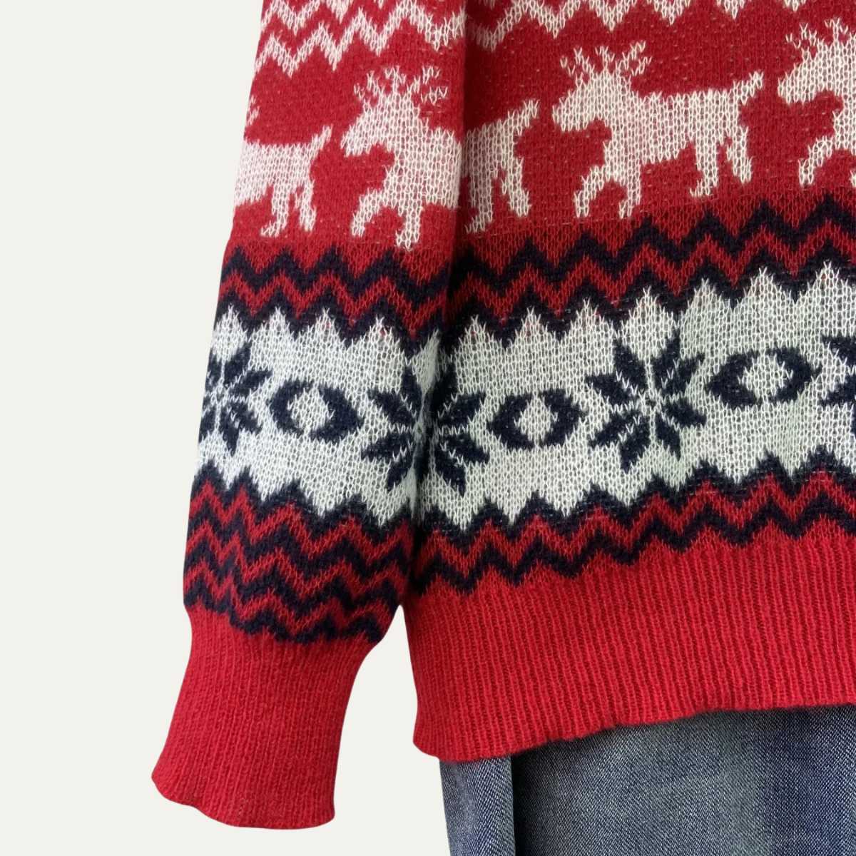 Man wearing a red reindeer knit Christmas sweater