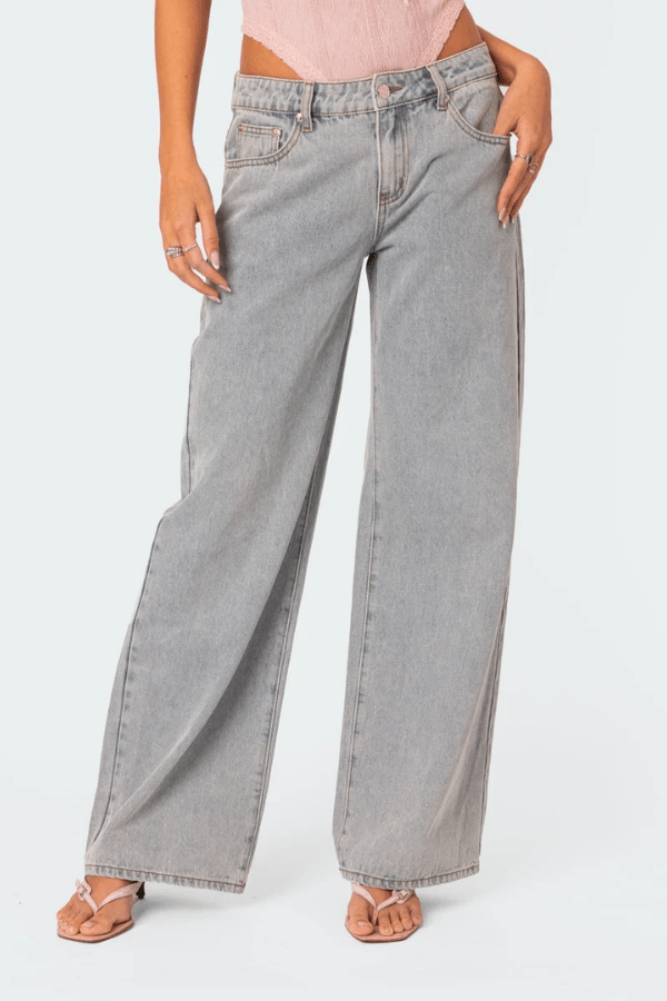 Woman wearing Beatrix bow pocket wide leg jeans