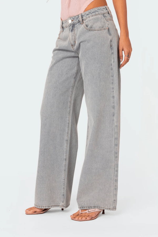 Woman wearing Beatrix bow pocket wide leg jeans