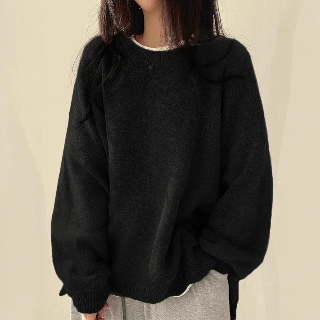 Woman wearing a cozy oversized knit sweater