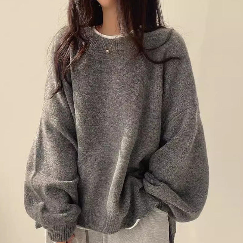 Woman wearing a cozy oversized knit sweater