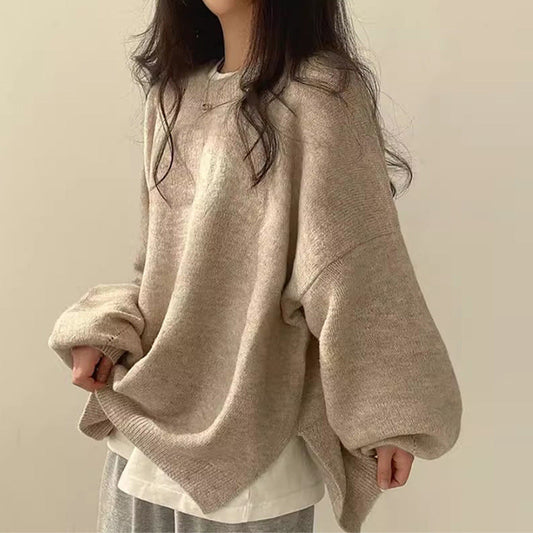 Woman wearing a cozy oversized knit sweater