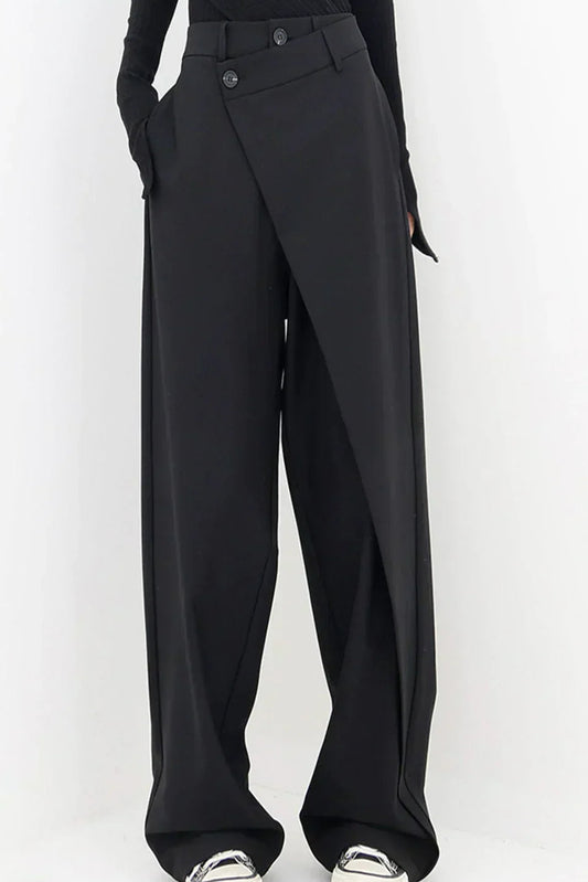 Woman wearing black wrap front wide leg pants