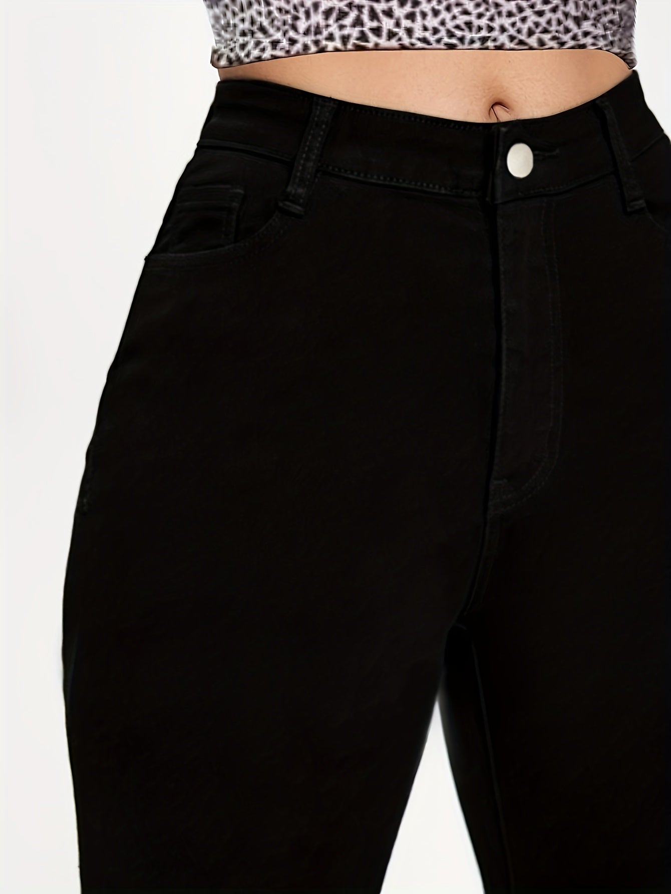 Woman wearing high waist skinny stretch jeans