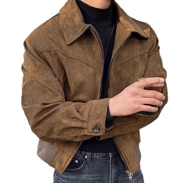 Man wearing a black faux leather zip jacket