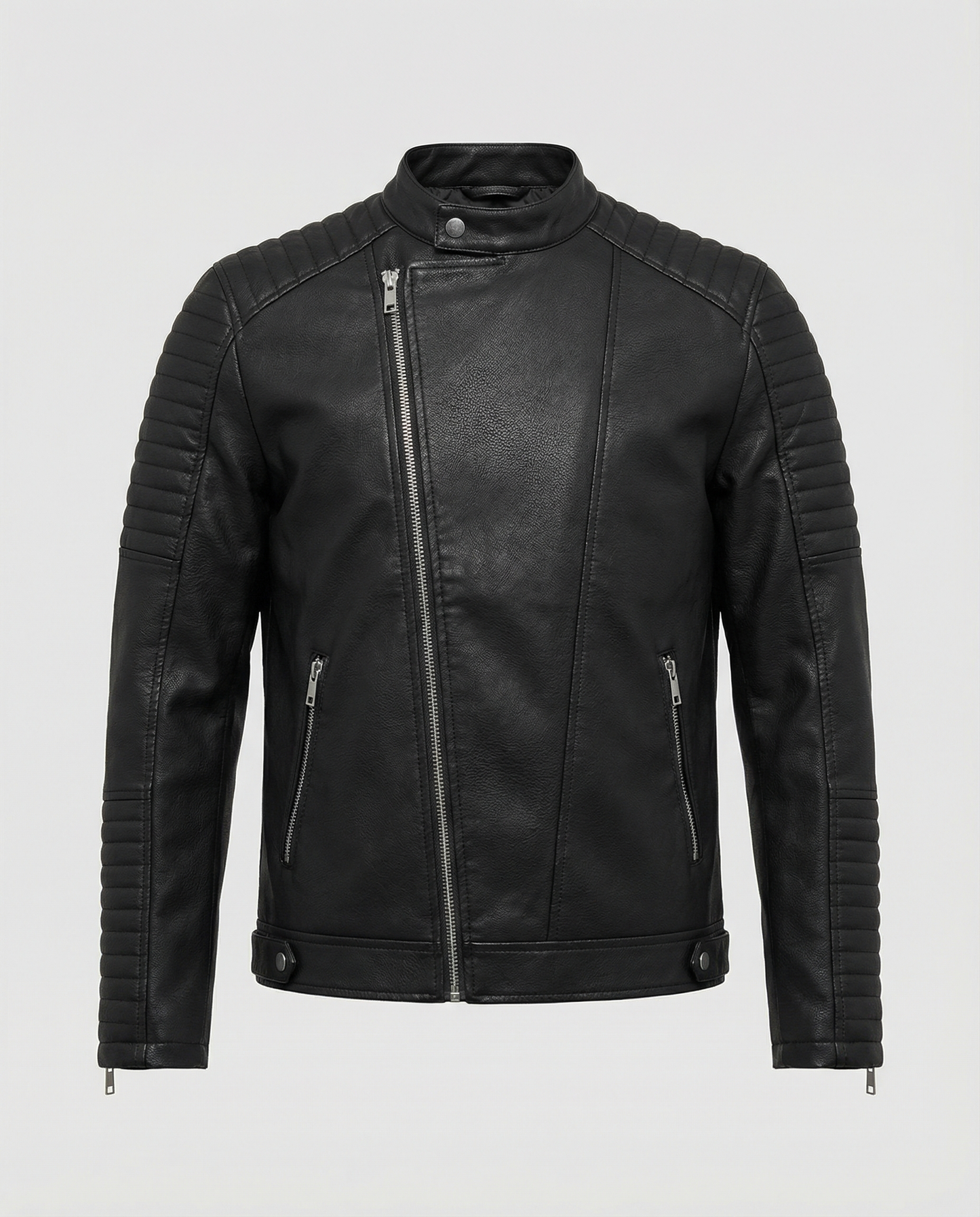 Woman wearing a tailored black faux leather jacket