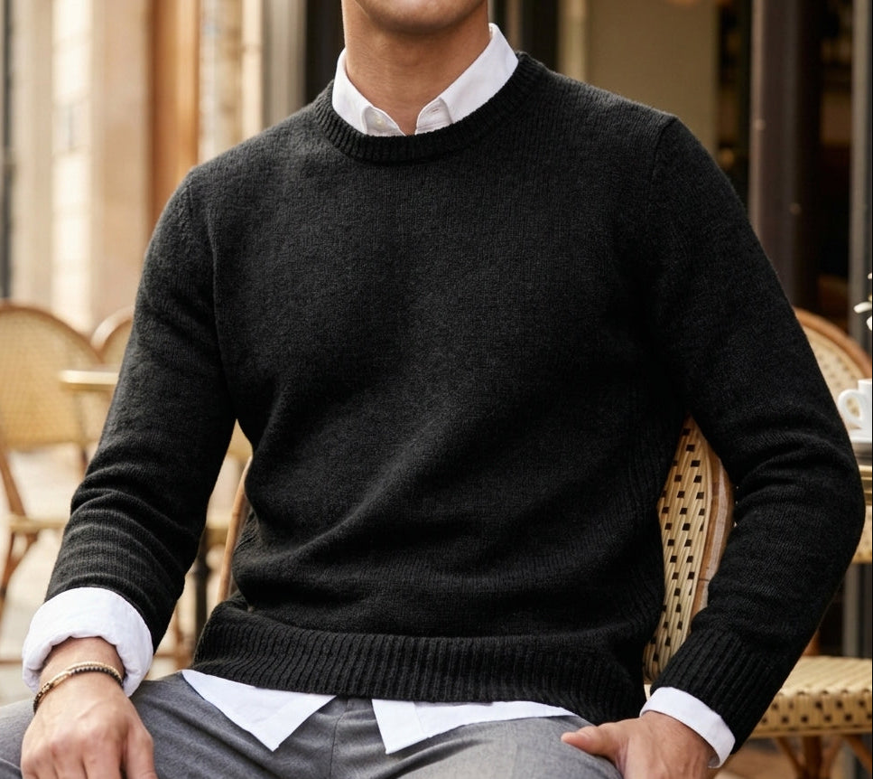 Man wearing a soft crewneck cashmere blend knit sweater over a collared shirt