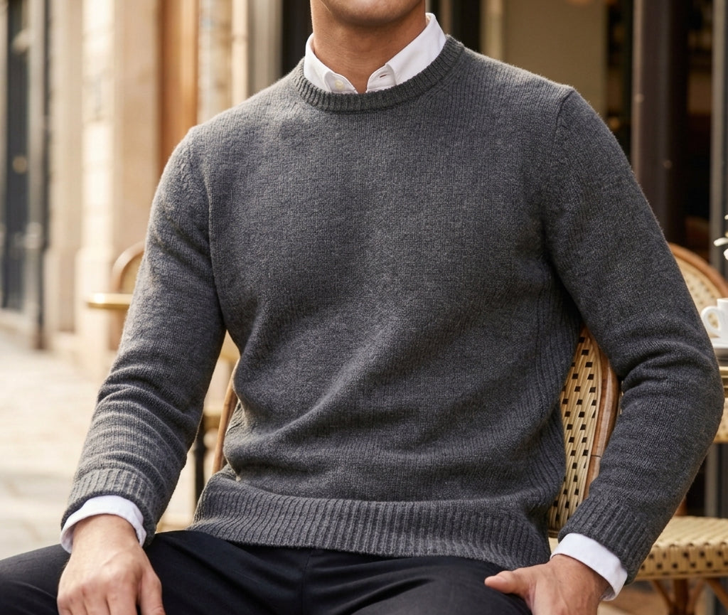Man wearing a soft crewneck cashmere blend knit sweater over a collared shirt