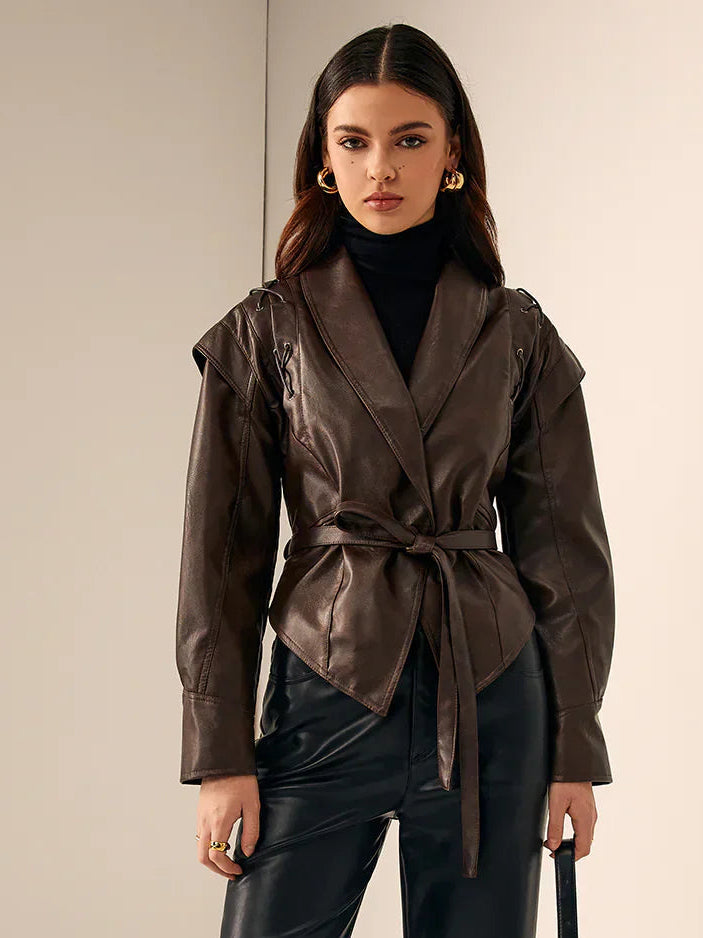 Woman wearing a faux leather blazer jacket