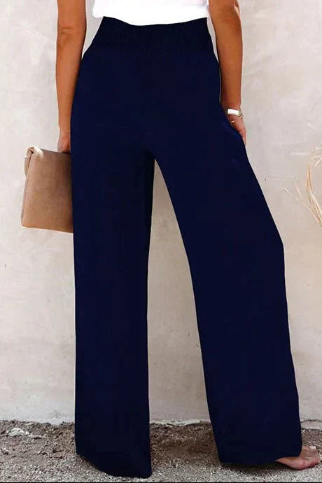 Woman wearing gray wide leg pants