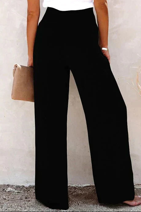 Woman wearing gray wide leg pants