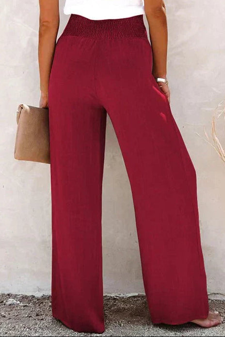 Woman wearing gray wide leg pants