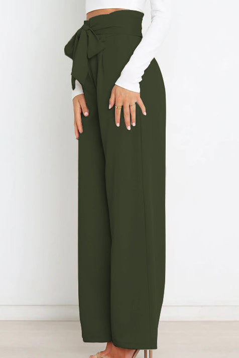 Woman wearing paperbag waist wide leg pants