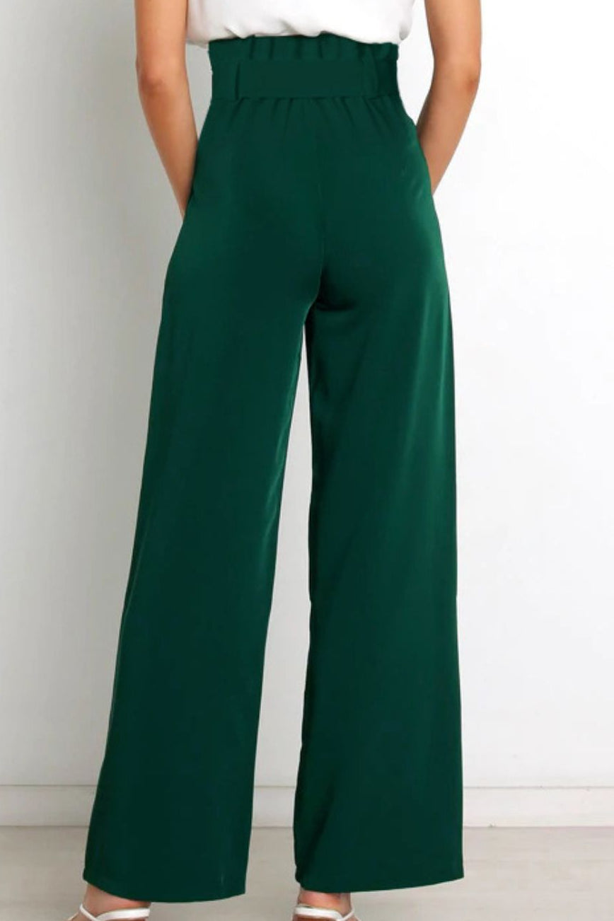 Woman wearing paperbag waist wide leg pants