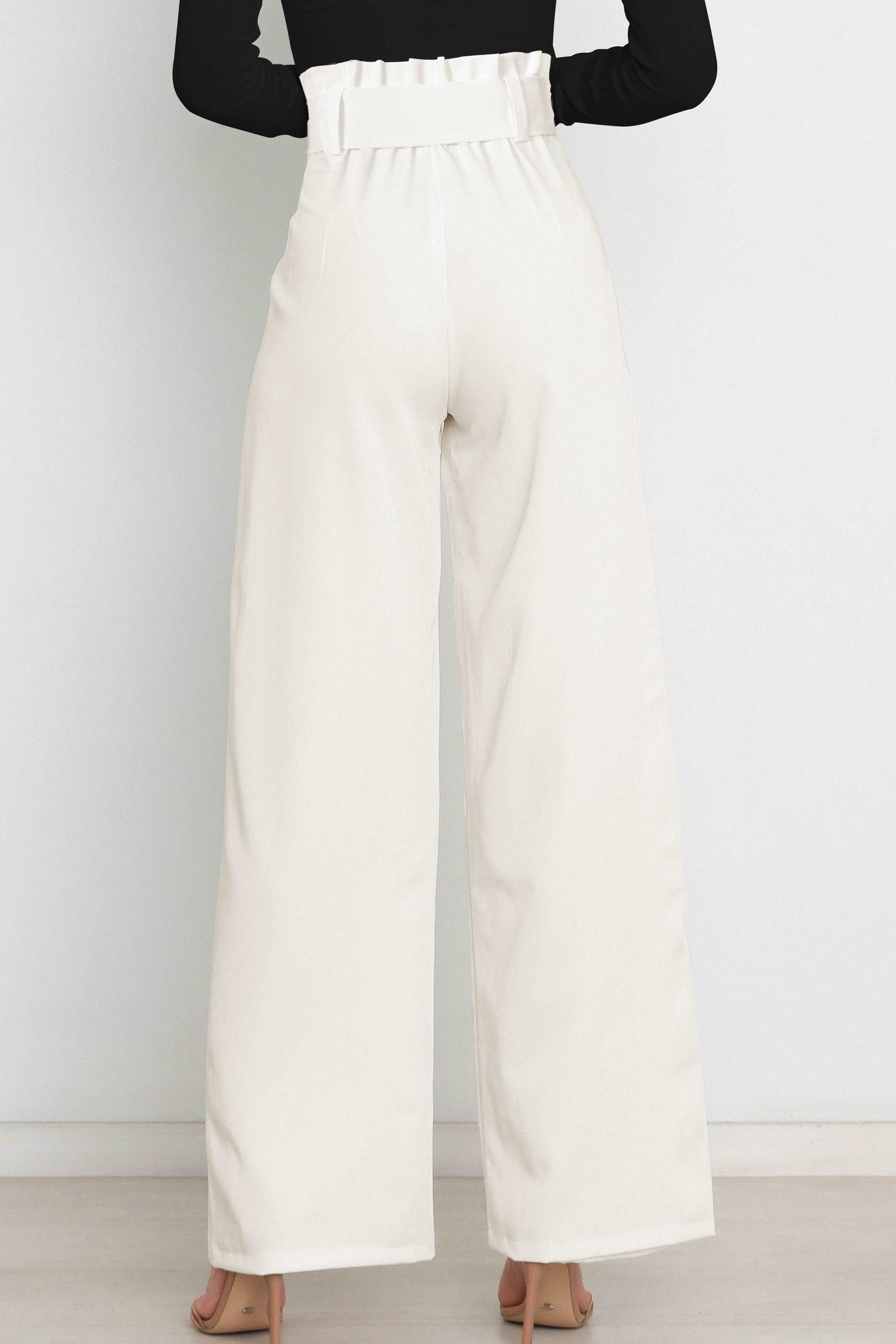 Woman wearing paperbag waist wide leg pants