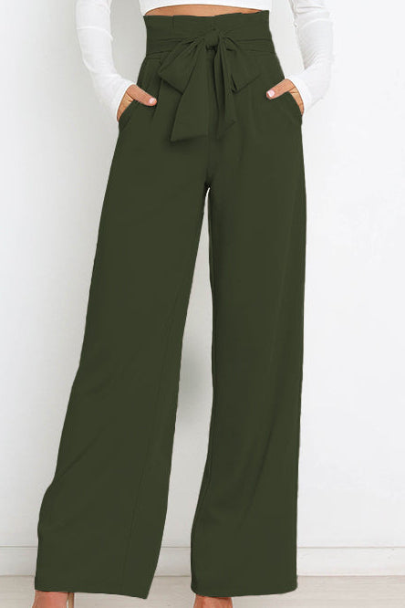 Woman wearing paperbag waist wide leg pants