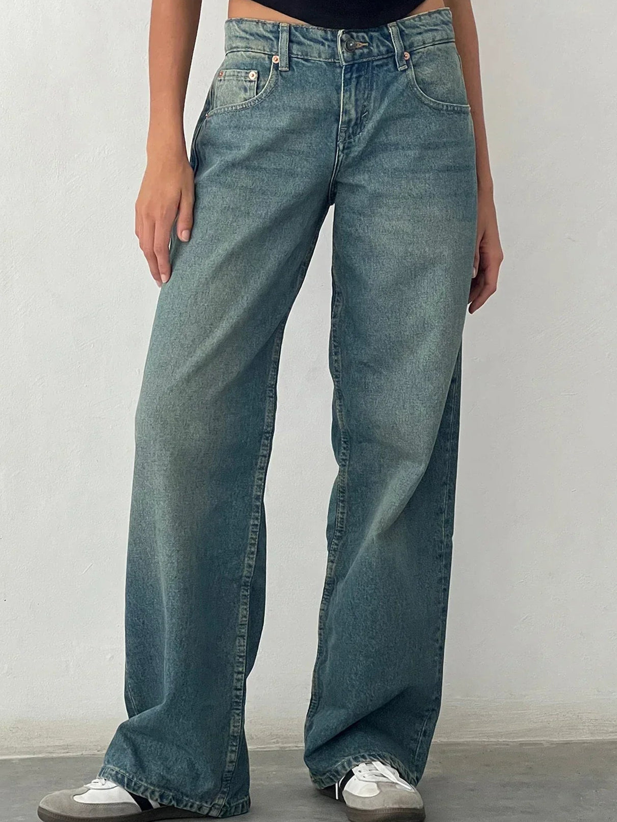 Woman wearing Daphne vintage baggy wide leg jeans