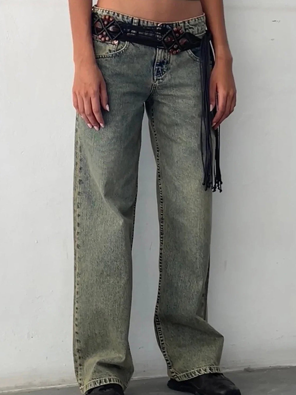 Woman wearing Daphne vintage baggy wide leg jeans