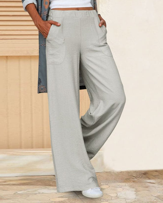 Woman wearing black wide leg pants