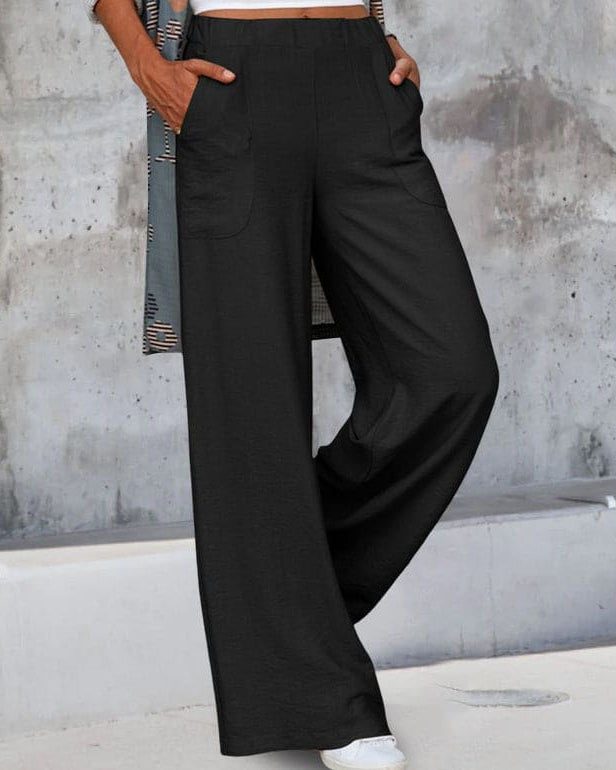 Woman wearing black wide leg pants