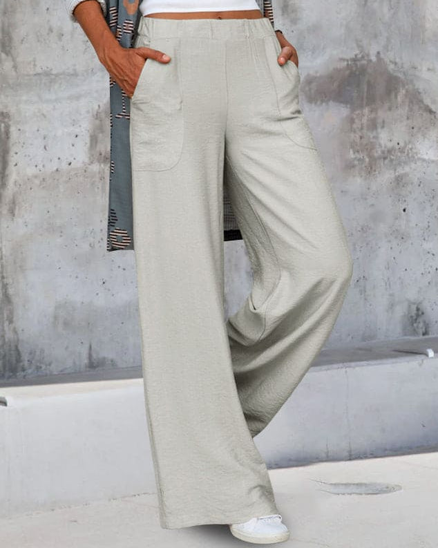 Woman wearing black wide leg pants