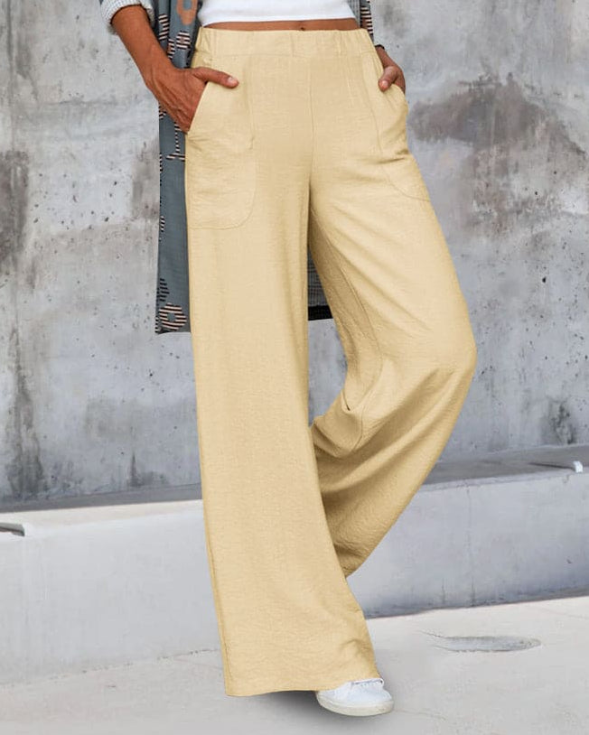 Woman wearing black wide leg pants