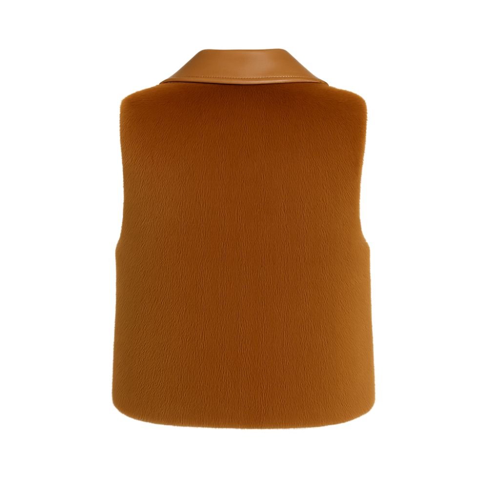 Woman wearing a cropped cognac faux fur vest with a leather look lapel collar
