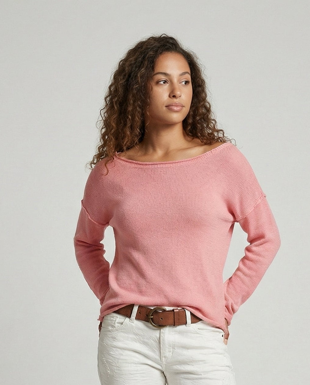 Woman wearing a lightweight long sleeve round neck top